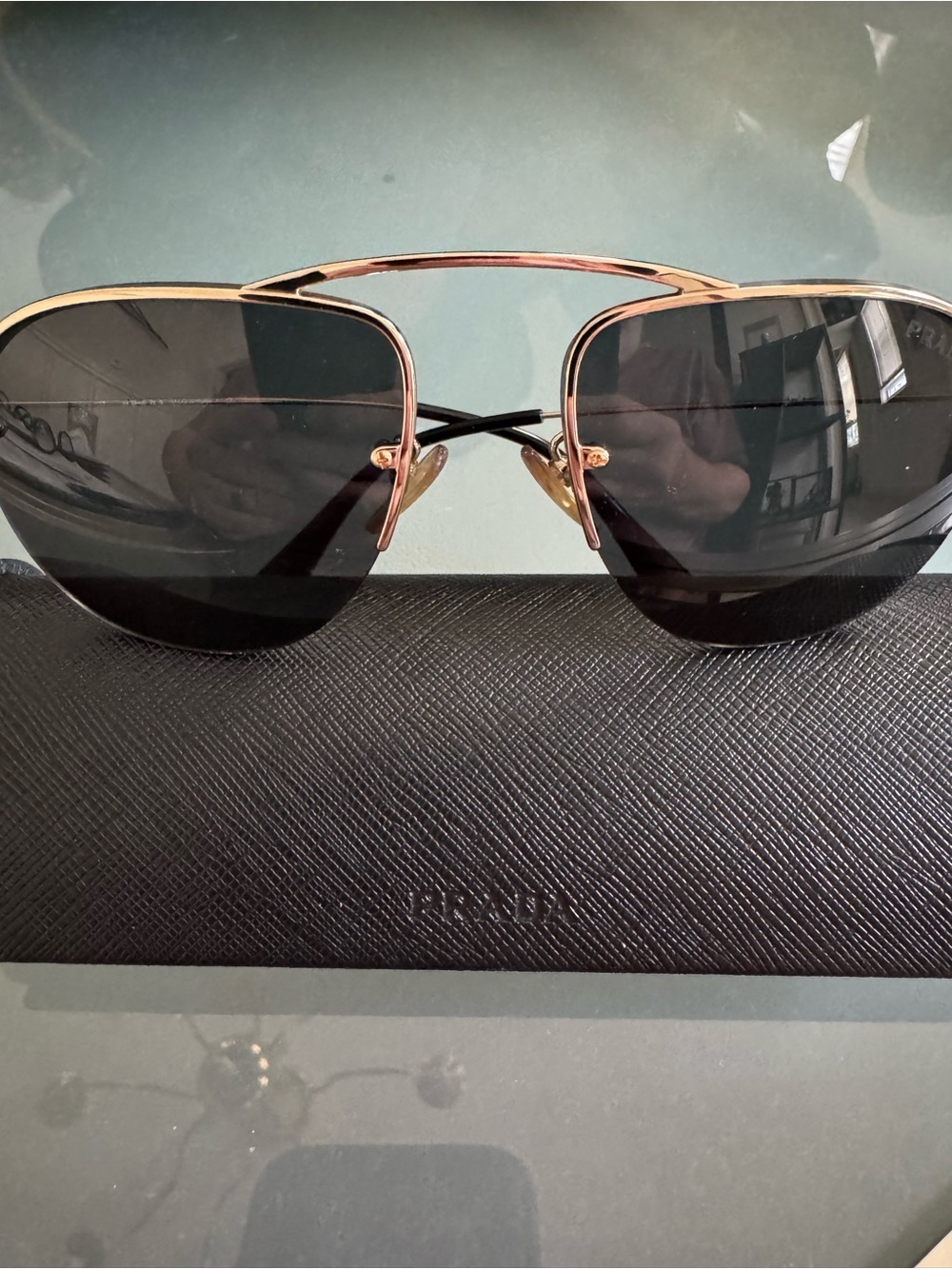 Prada Men’s Black Temples with Gold Accents Rimless Sunglasses - Picture 6 of 7